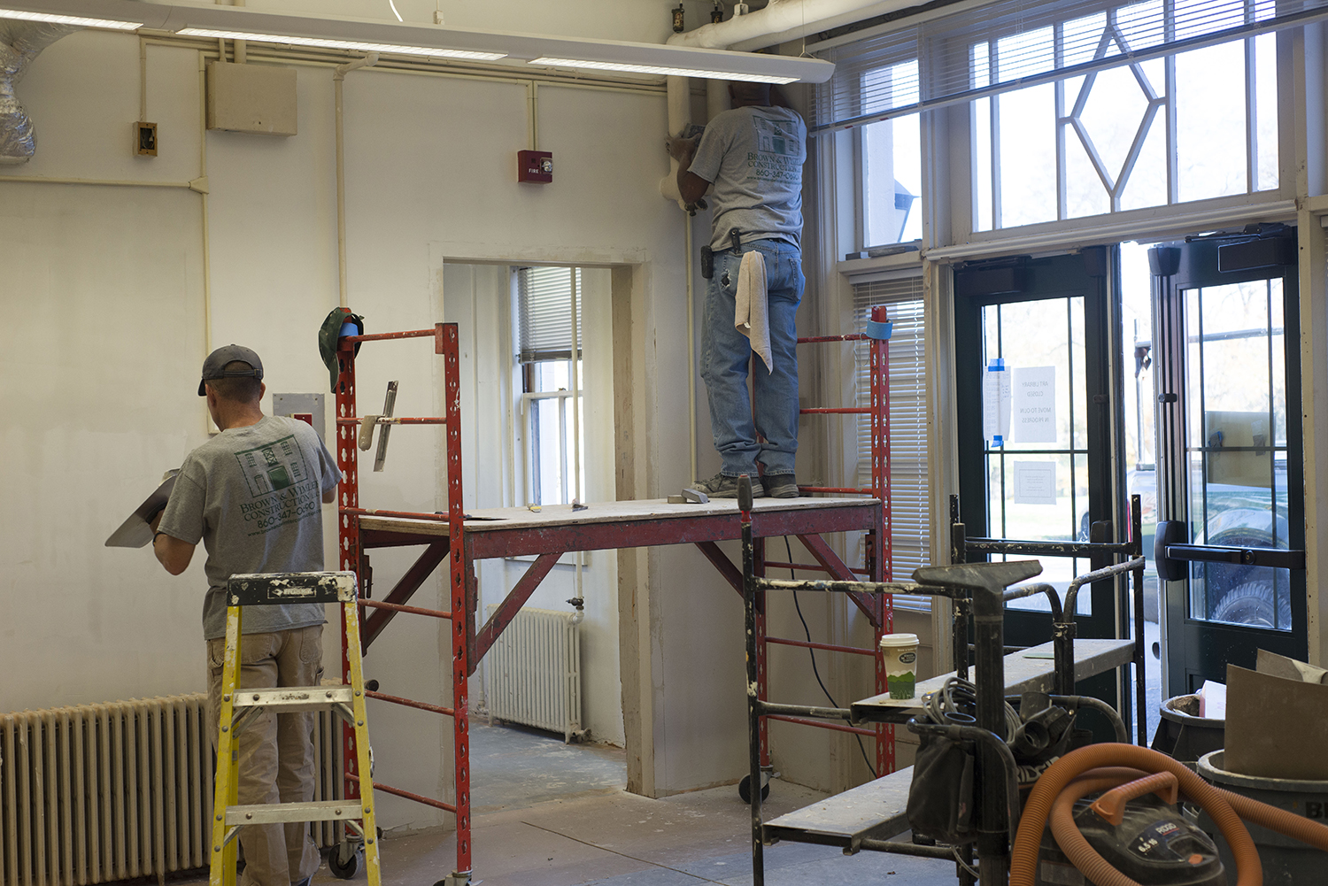 Contractors are working to restore and transform the Davison Art Center's carriage house section into a Digital Design Studio. The space formerly housed the Art Library