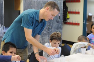 Brian Northrop works with children at the Green Street Arts Center. 