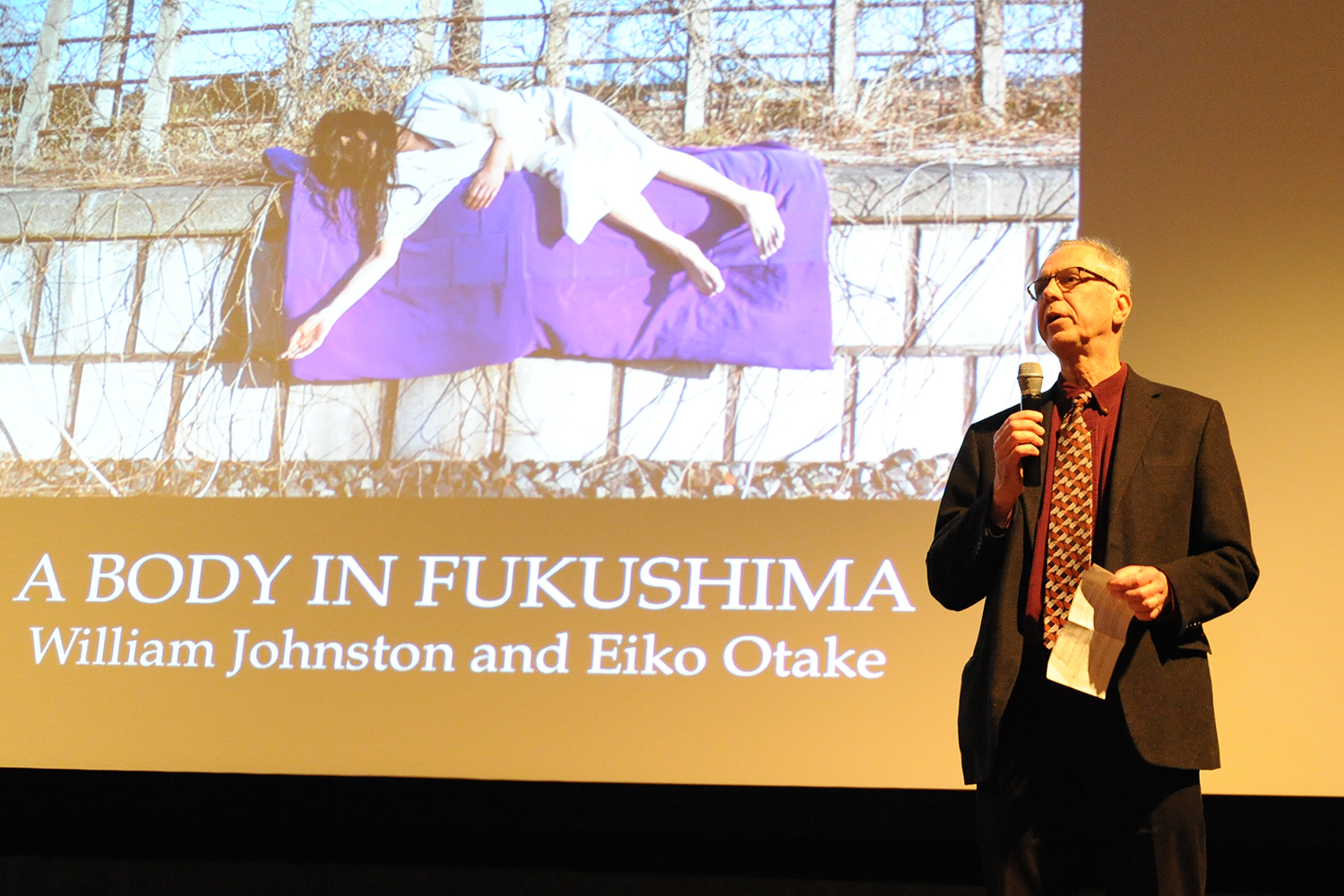 Patrick Dowdey, curator for the Freeman Center for East Asian Studies gallery, introduced the <em>Body in Fukushima</em> exhibit Feb. 5. 