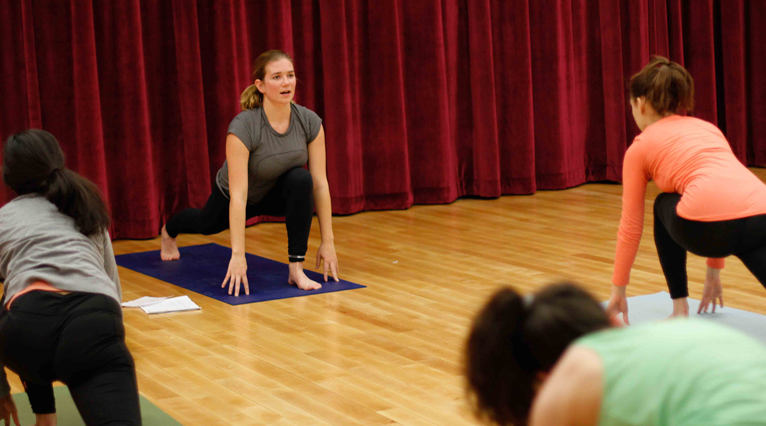 Katie McLaughlin '15 teaches a WesBAM! class called Vinyasa Flow Fusion, which combines meditation, breathing techniques and traditional asana practice for whole body health and happiness.