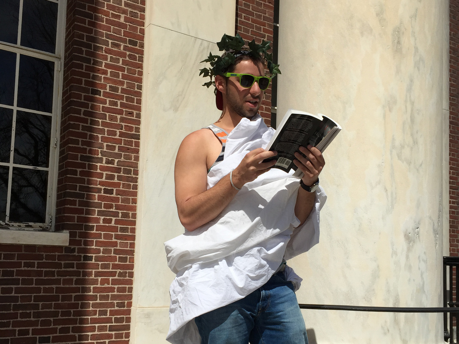 Emerson Obus '16 reads from Homer's "Odyssey" outside Olin Memorial Library on April 16 as part of the annual day-long Homerathon sponsored by the Department of Classical Studies.