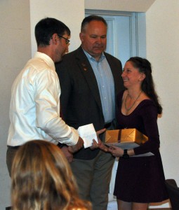 At the banquet, Pat Tynan, head women's crew coach, and Athletic Director Mike Whalen '83 presented an award to Brianne Wiemann '15.