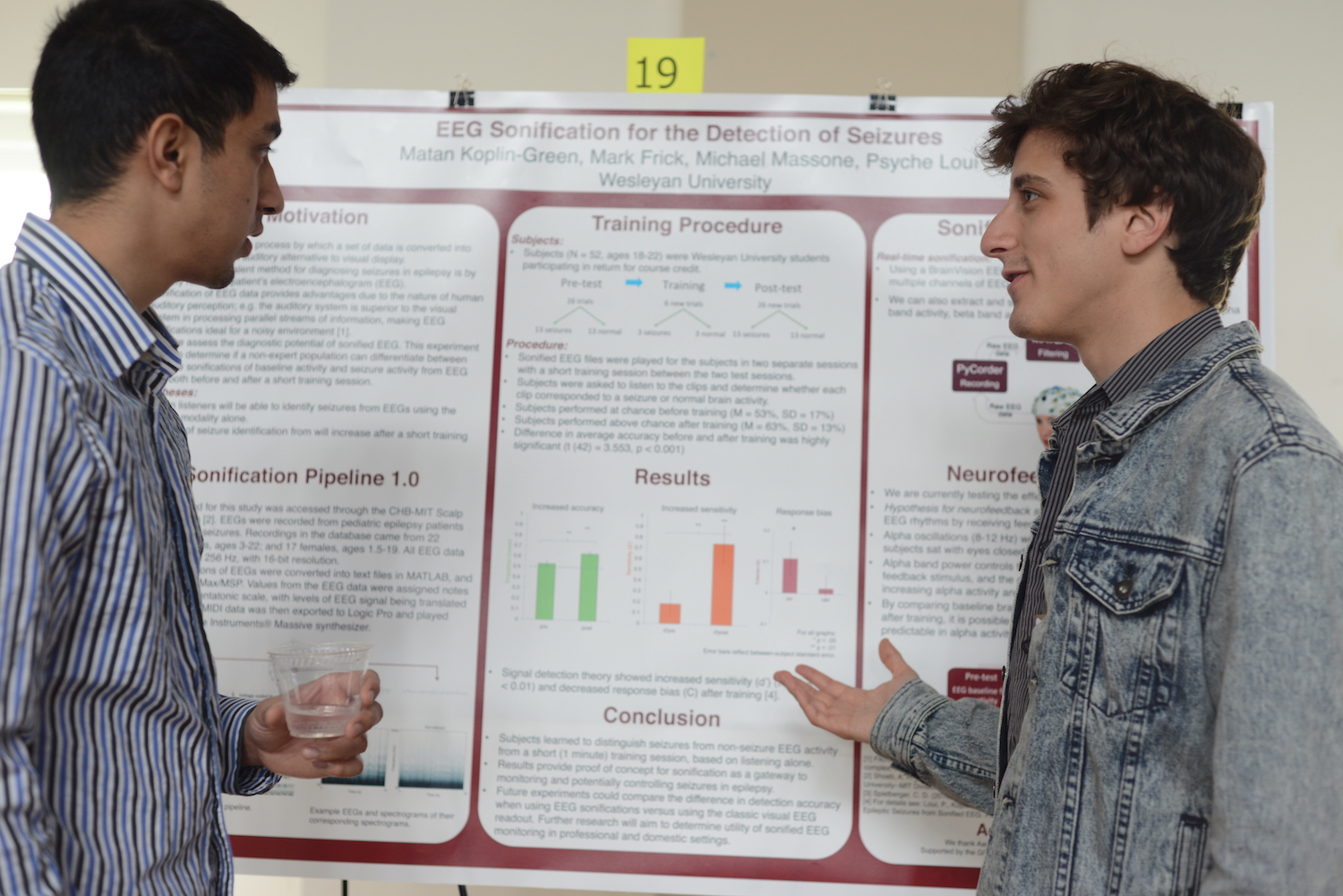Matan Koplin-Green '15, right, discusses his project on "EEG Sonification for the Detection of Seizures."