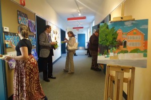 Visitors view the art at the Green Street anniversary celebration.  (photo c/o Lu Imbriano )