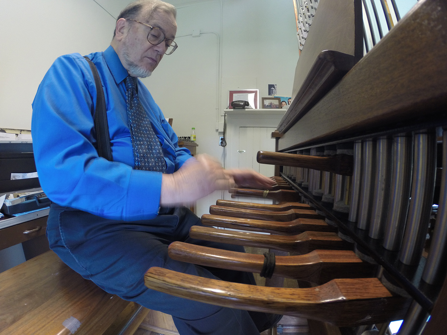 George Matthew plays the 24-bell carillon atop South College.