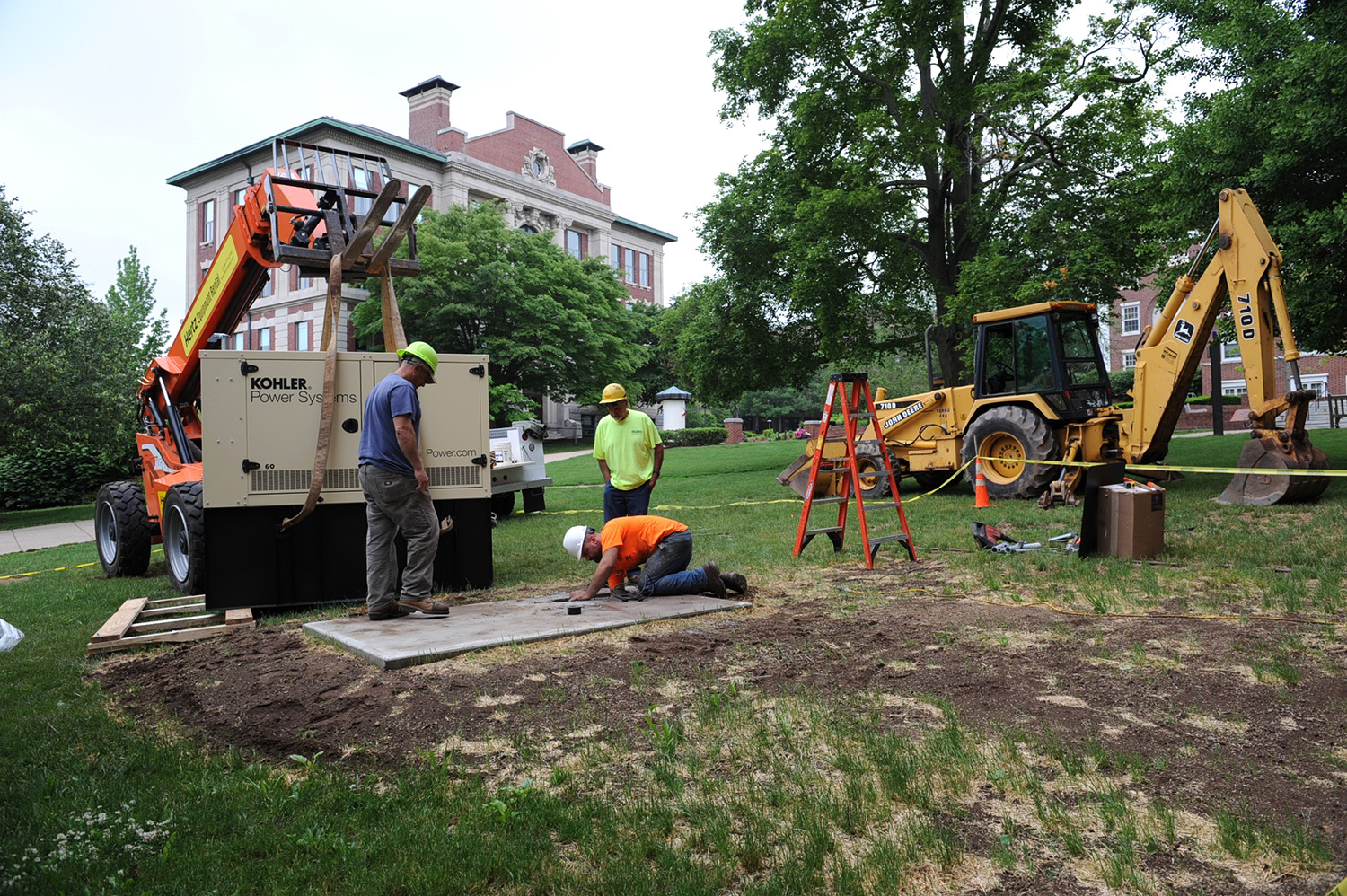 Workers installed a new generator at Judd Hall in early June.