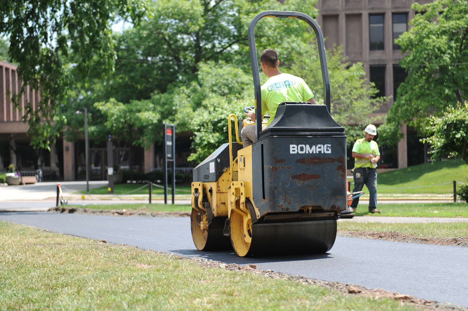 The asphalt sidewalks are being replaced throughout the Foss Hill complex.