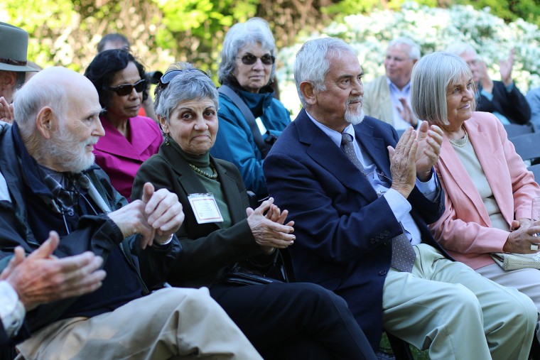 Several Wesleyan faculty, fellow emeriti, family and friends attended the retiring faculty reception on May 23 including, from left, Peter Frenzel, professor of German studies, emeritus; Krishna Winston, the Marcus L. Taft Professor of German Language and Literature; Herbert Arnold, professor of German and Letters, emeritus; and Annemarie Arnold, adjunct professor of German studies, emerita. 