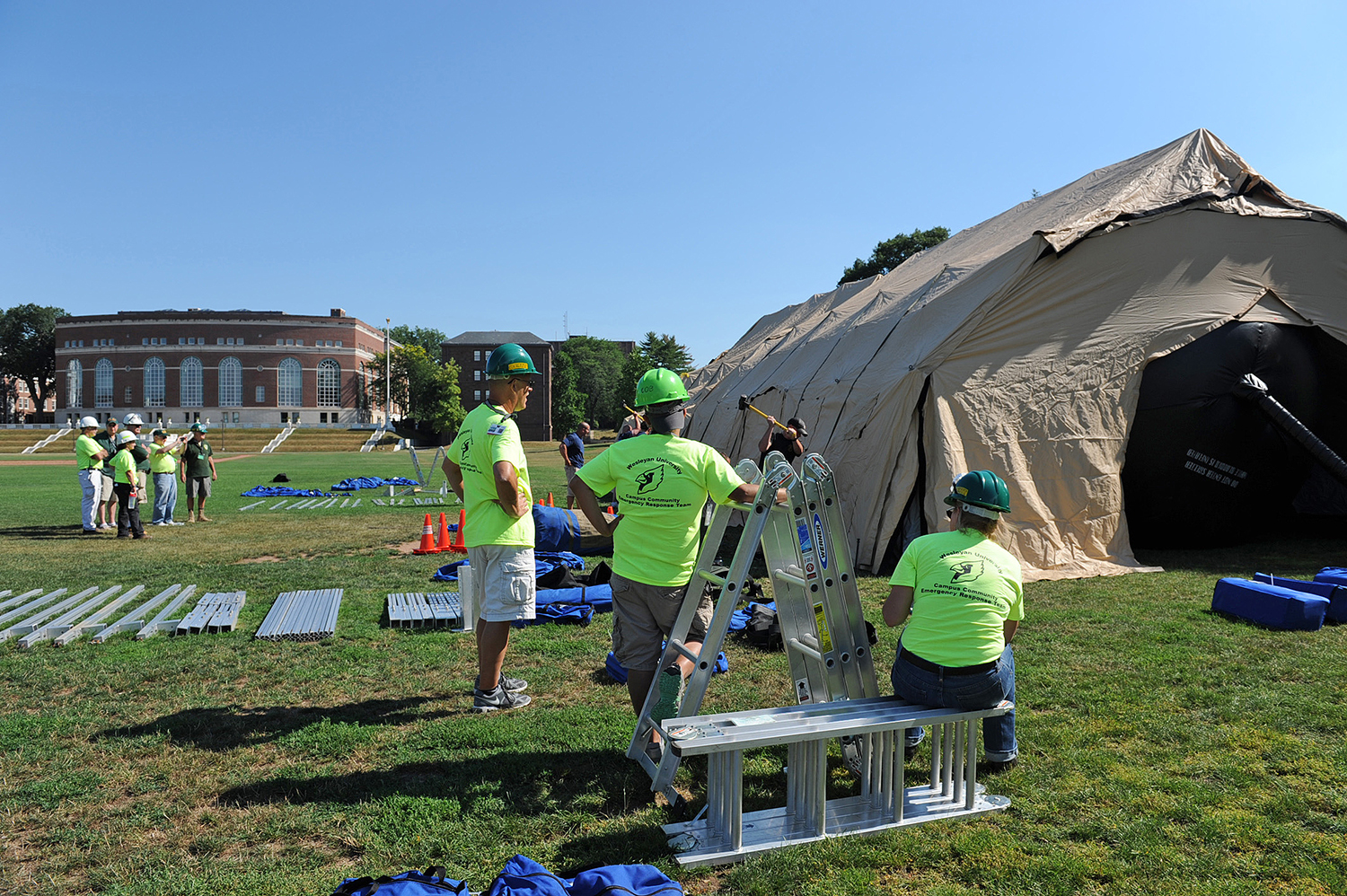 On Aug. 3, more than 20 Wesleyan employees helped erect a tent that could be used as a mobile hospital in the event of an emergency situation. Members of Wesleyan’s Campus Community Emergency Response Team (C-CERT) constructed the mobile unit with guidance from Middletown Emergency Management and Middletown Fire Department.