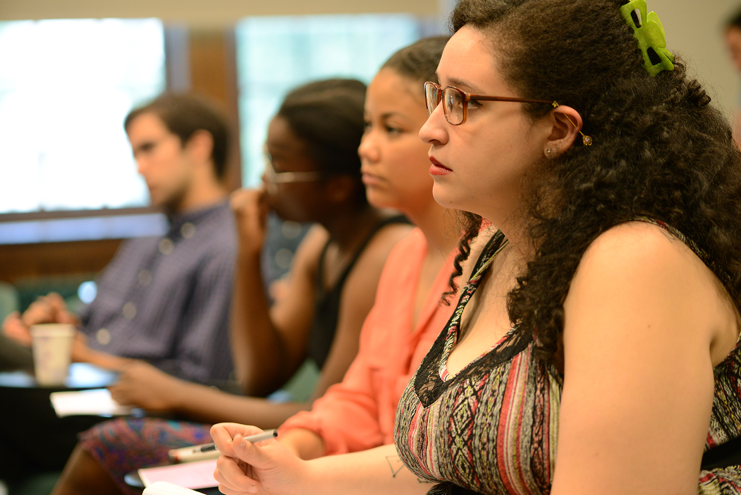 At right, Taina Quinones ’17 spoke on “Constructing Latino Identity: An Analysis of Nuyorican Spoken Word as Establishing Existence.”