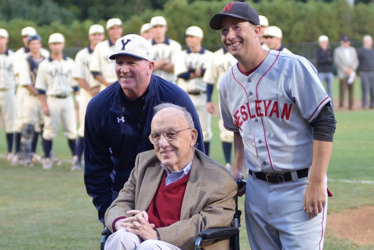 At left, Yale University head coach John Stupe and Wesleyan head coach Mark Woodworth welcomed Fay Vincent to the reenactment game. Vincent served as the Commissioner of Major League Baseball from 1989 to 1992.