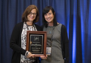 Janice Naegele accepting the award at the Society for Neuroscience's annual meeting.