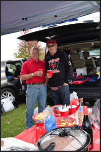 In advance of Wesleyan football's Homecoming match, various athletic teams host tailgates on Andrus Field for family, friends and alumni, with concessions provided by the baseball and softball teams. (Photo by John Van Vlack)