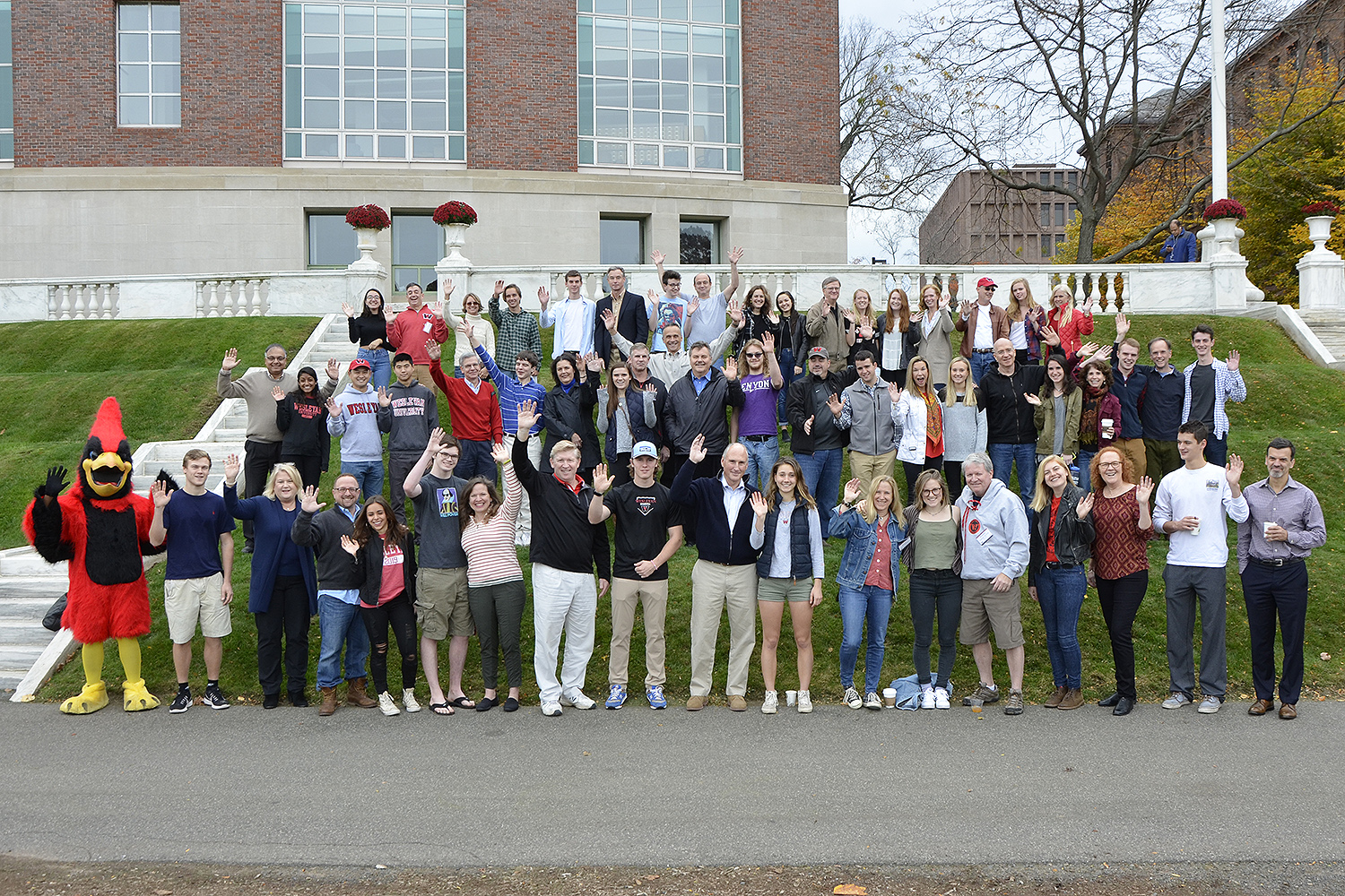 Alumni and their children joined in for Homecoming Weekend's annual legacy photo on Nov. 7, taken on Denison Terrace. (Photo by John Van Vlack)