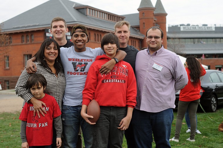 Members of the Wesleyan community, friends and family gathered on Andrus Field on Nov. 7 for tailgaiting before the Homecoming football game against rival Wlliams College. (Photo by Olivia Drake MALS '08)
