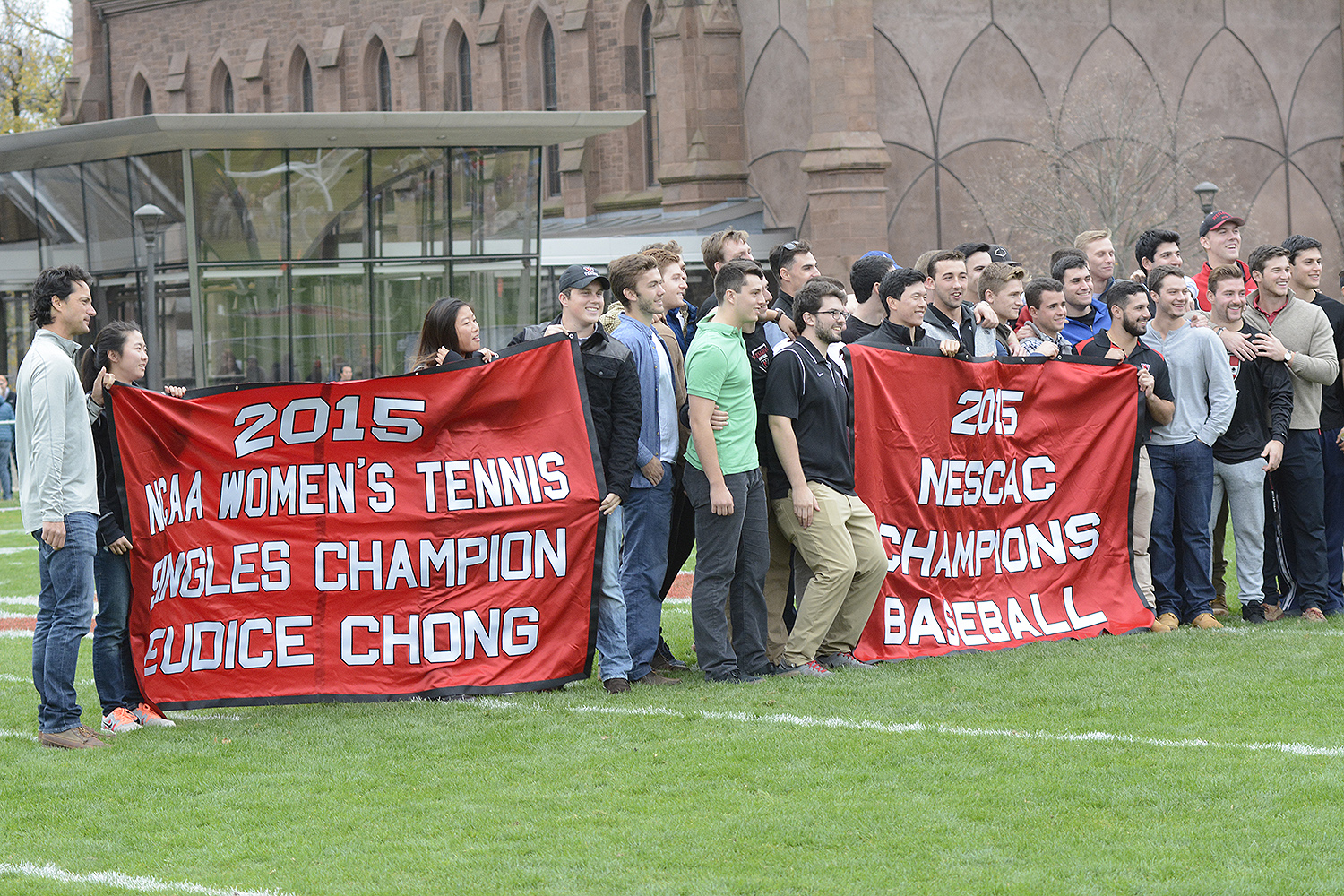During Wesleyan’s Homecoming game Saturday, Wesleyan's Director of Athletics Mike Whalen honored the achievements of outstanding student athletes. He praised the 2014-15 men’s basketball team, 2015 baseball team, and tennis stars Eudice Chong ’18 and Victoria Yu ’19. 