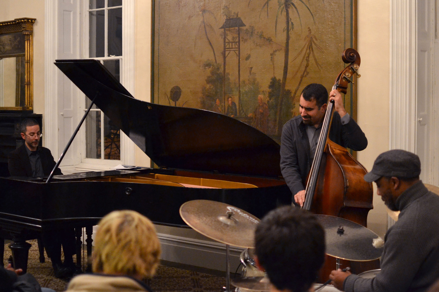 Graduate Liberal Studies hosted a combined concert and talk on Monday, November 30th entitled Monk and Mingus: The Cutting Edge of Jazz. Jazz Ensemble Coach Noah Baerman performed on piano, accompanied by bassist Henry Lugo, and Visiting Assistant Professor of Music Pheeoroan akLaff on percussion.