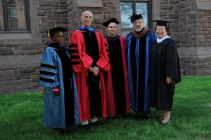 In 2015, Wesleyan President Michael Roth (second from left) and Daphne Kwok ’84, chair of the Wesleyan Alumni Association (fifth from left) presented The Binswanger Prize for Excellence in Teaching to Gina Athena Ulysse (at left), Michael Calter and David Schorr. (Photo by John Van Vlack)