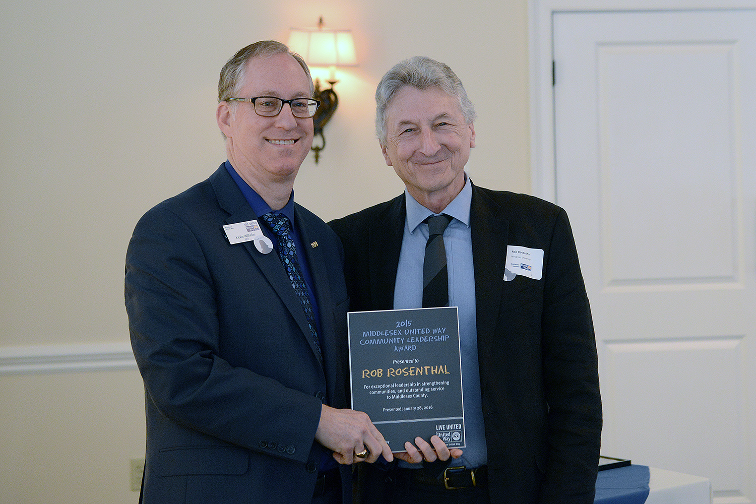 Middlesex United Way Executive Director Kevin Wilhelm presented the award to Rosenthal.
