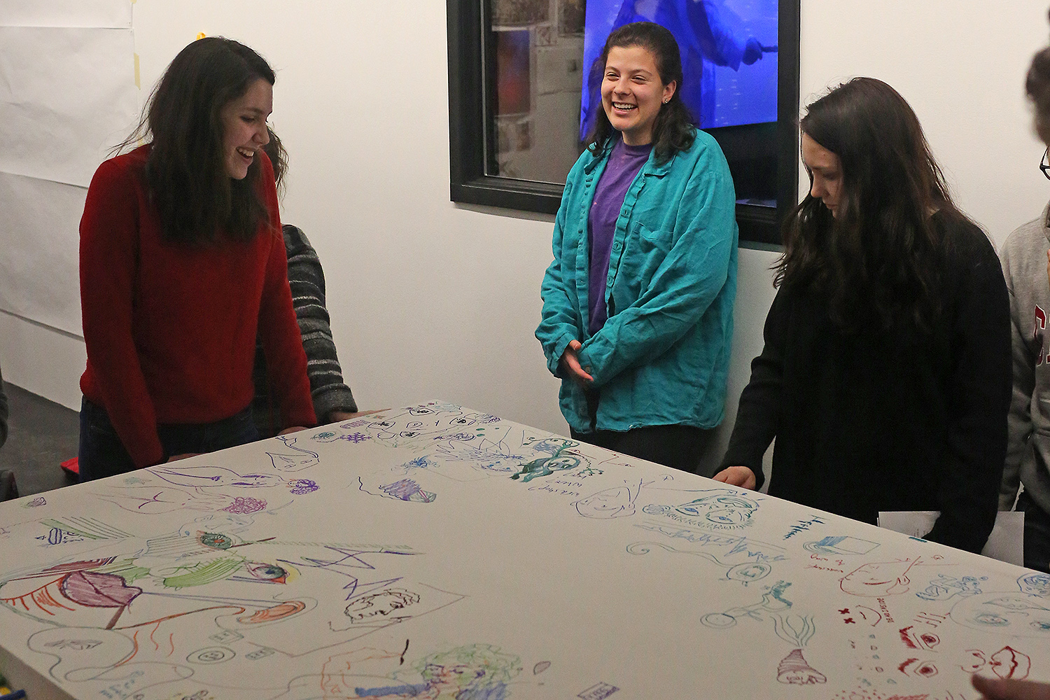 Students gather to celebrate the opening of the Workshop, a student run art space on campus