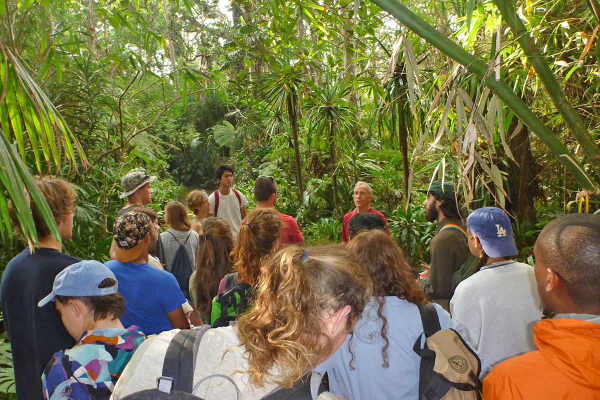 Norman Bezona, steward of the Kona Cloud Forest Sanctuary, introduces the class to the forest.