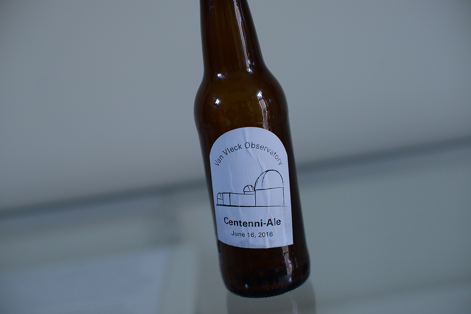 Roy Kilgard, support astronomer and research associate professor of astronomy, brewed Centenni-Ale for the occasion.