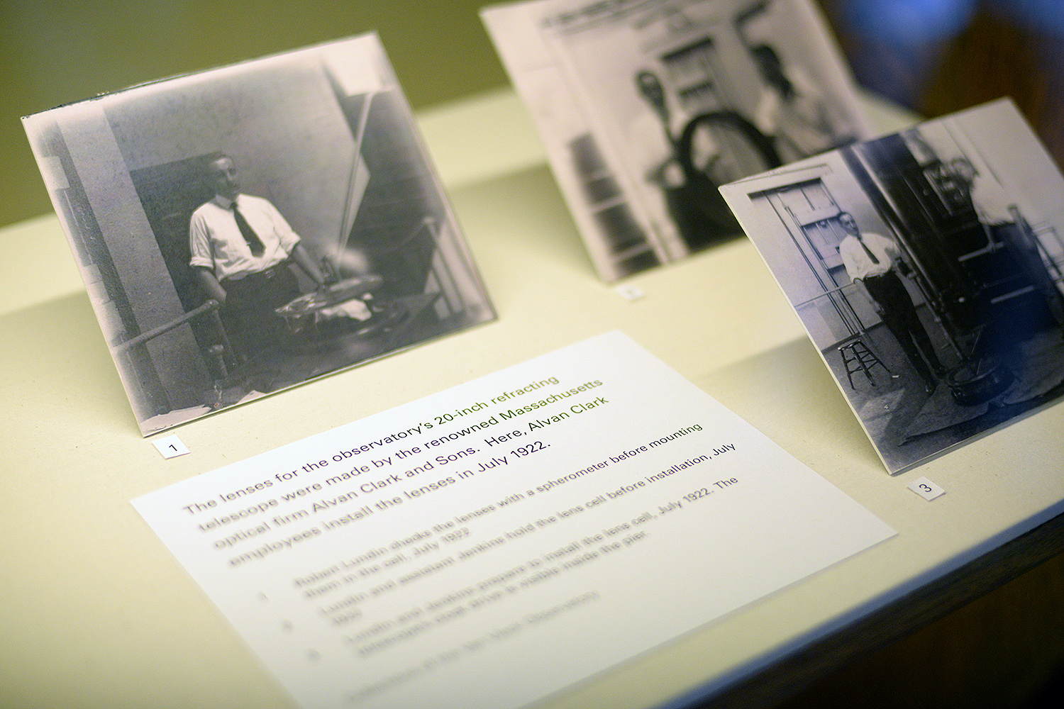Photographs on display in the exhibit included shots of employees of the renowned optical firm Alvan Clark and Sons installing lenses on the observatory's 20-inch refracting telescope in July 1922.