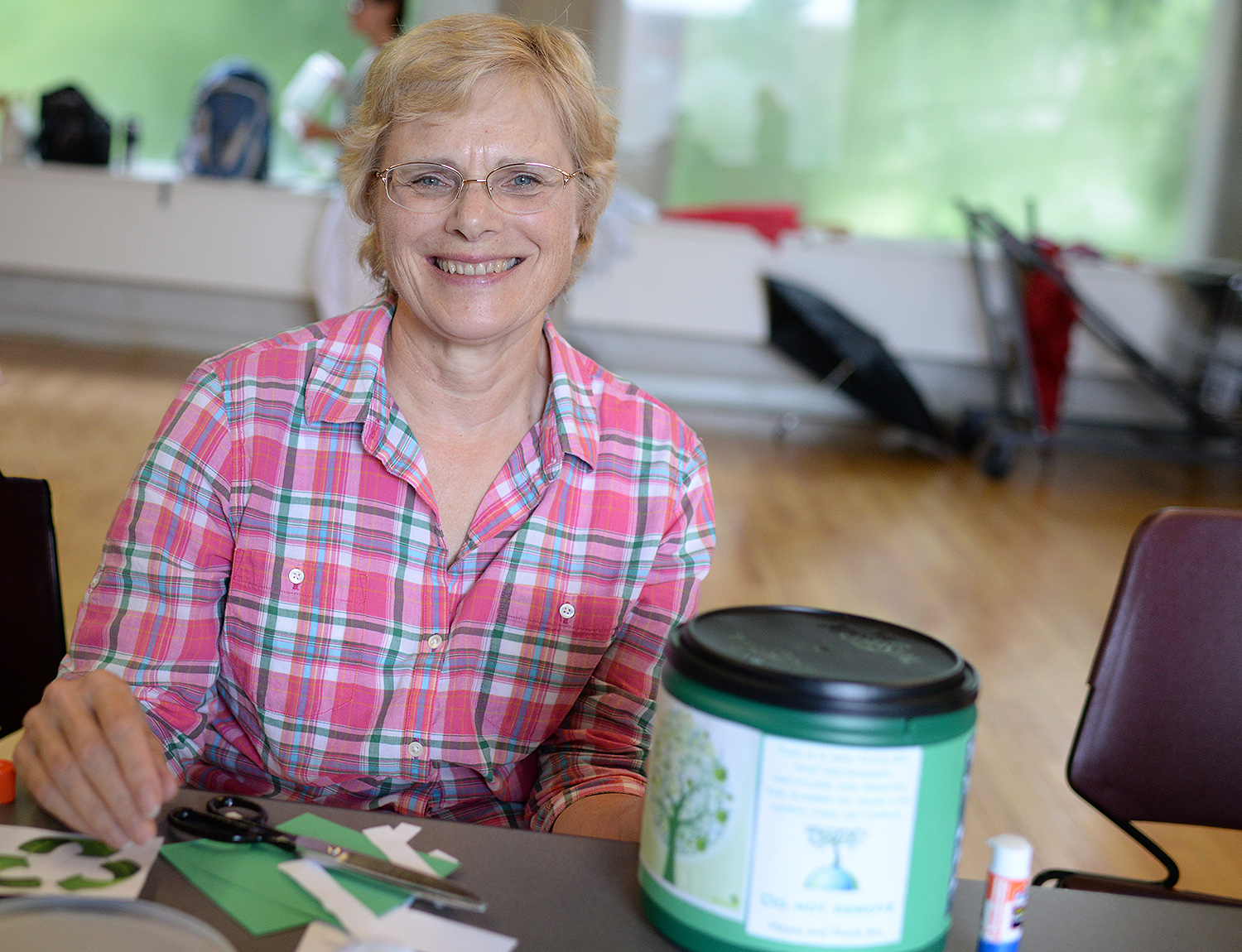 Liz Tinker, administrative assistant in the English Department, works on finalizing her mini-bin.