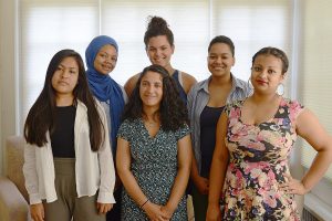 From left, Delia Tapia ’18, Alicia Strong ’18, Aura Ochoa ’17 (front), Iryelis Lopez ’17 (back), Paige Hutton ’18 and Aleyda Robles ’18 spent six weeks this summer developing research topics as part of the Mellon Mays Undergraduate Fellowship Program. They presented their ideas on July 28, 2016 at the Center for African Studies.