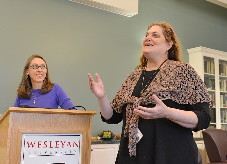 At right, Melissa Katz, visiting assistant professor of romance languages and literatures, speaks about the book she chose for essay winner Daniel Atik '20. Several faculty attended the essay content award ceremony to applaud and speak about their students' essays.