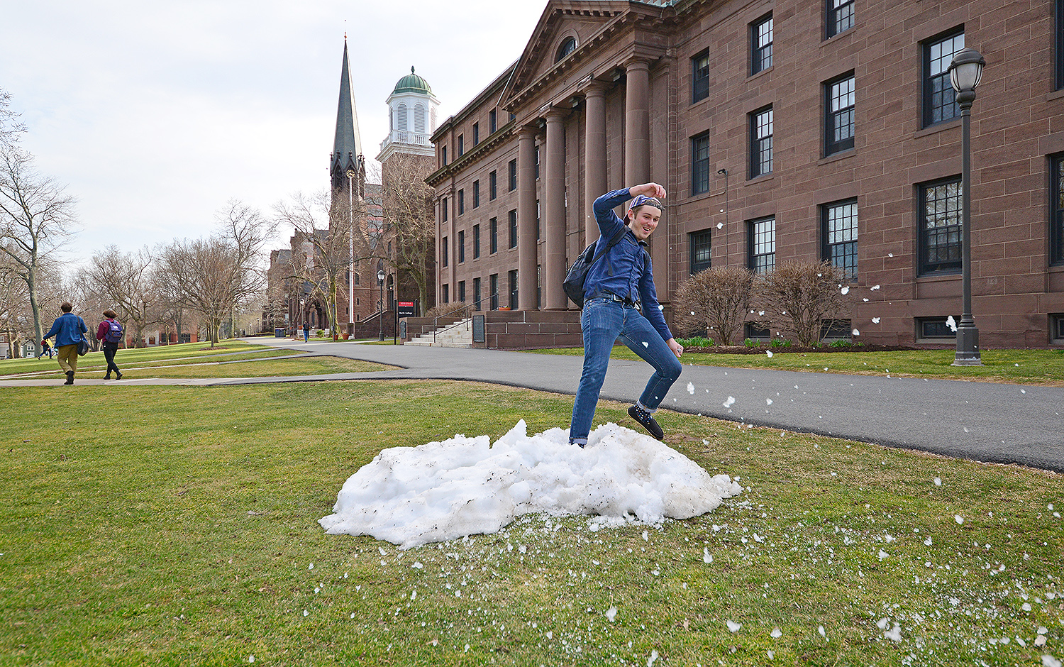 Will Barr ’18 frolics in Wesleyan’s last patch of snow April 3 on College Row. Will, who hails from Florida, is majoring in molecular biology and biochemistry and the College of Integrative Sciences. Temperatures reached 63 degrees. 