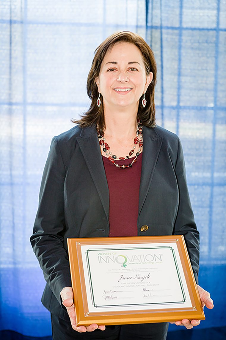 Jan Naegele accepts her Women of Innovation® award.