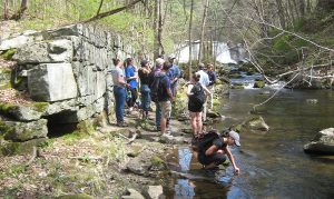 Keck students investigate remnants of Buena Vista/Hunts Lyman Iron Company Furnace site on the Hollenbeck River in Canaan, Connecticut. 