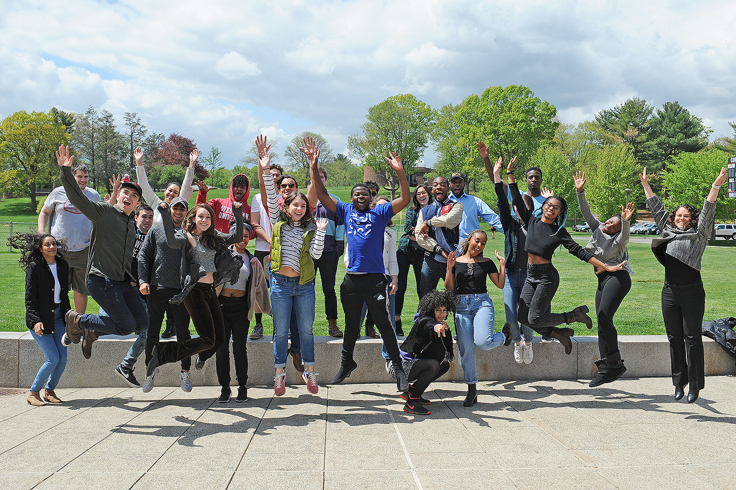 The 2016-17 Patricelli Center Fellows jumped for joy during their end-of-the-year celebration on May 9. 