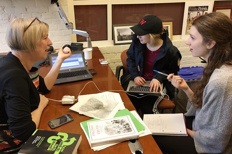 Rosie Dawson, a producer at the British Broadcasting Corporation (BBC), teaches Phie Towle '20 and Alea Laidlaw '20 about radio program development. 