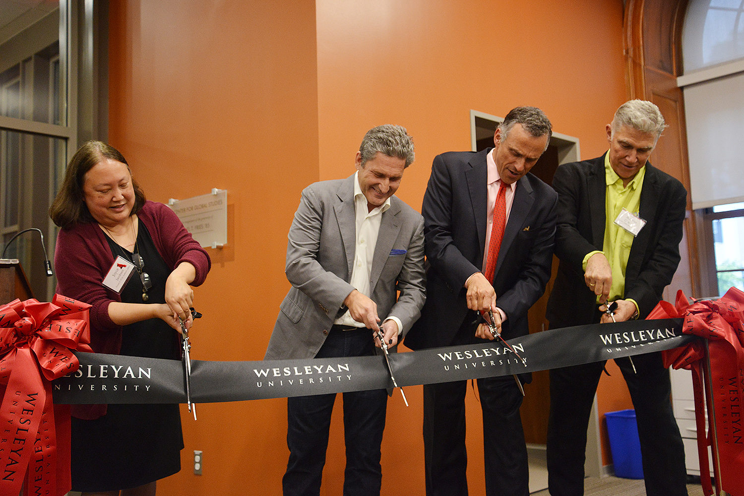 Provost Joyce Jacobsen, Michael Fries '85, Wesleyan President Michael Roth '78 and Professor Antonio Gonzalez participated in a ribbon-cutting ceremony May 25 at the Fries Center for Global Studies. 
