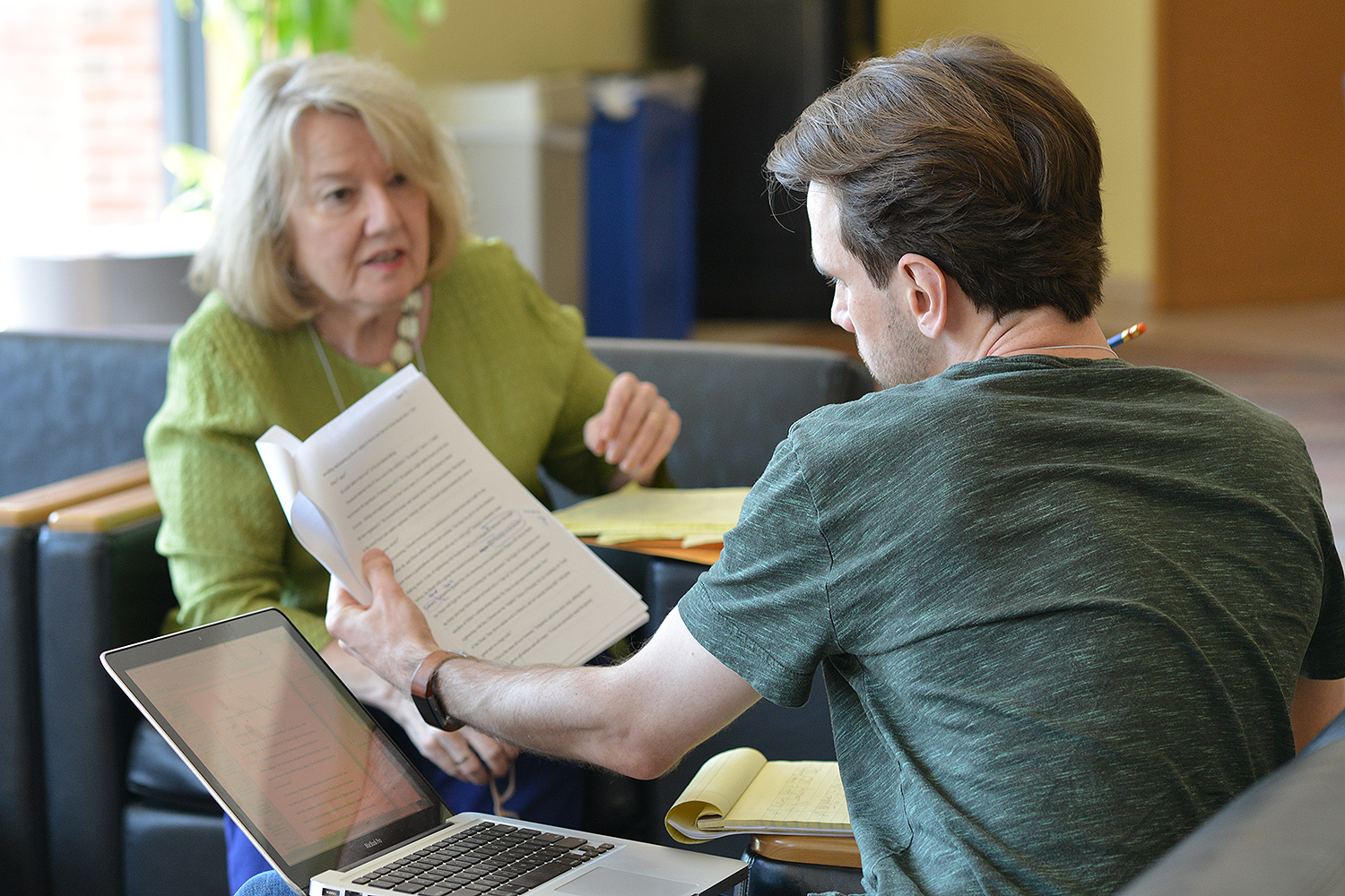 Journalist and author Lis Harris works one-on-one with a Wesleyan Writers Conference participant on June 15. 