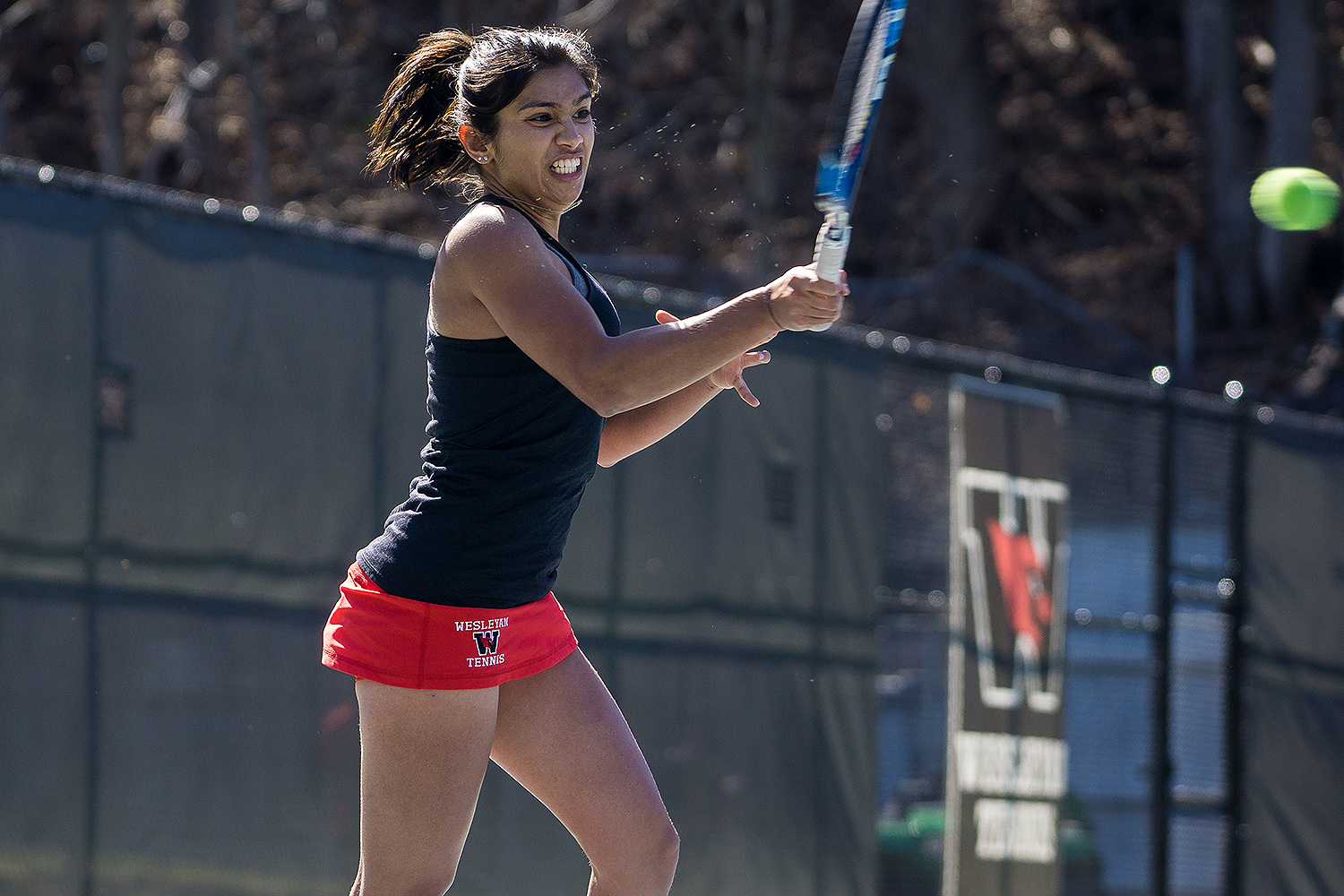 Aashli Budhiraja '18, pictured here playing an opponent from Williams, was one of six women tennis players to be named a Division III Scholar Athlete by the Intercollegiate Tennis Association.