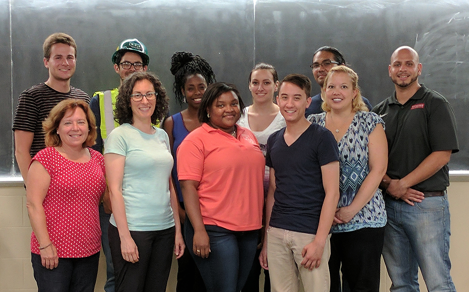 Pictured, back row, at left: Bill Ollayos, Andres Sarda, Erica Wright, Megan Conte, Smith Kidkarndee, Victor Diaz. Pictured front tow, at left: Mary from the City of Middletown, Janet Desmarais, Sandy Durosier, Bobby Spignesi, Christine Daniels.