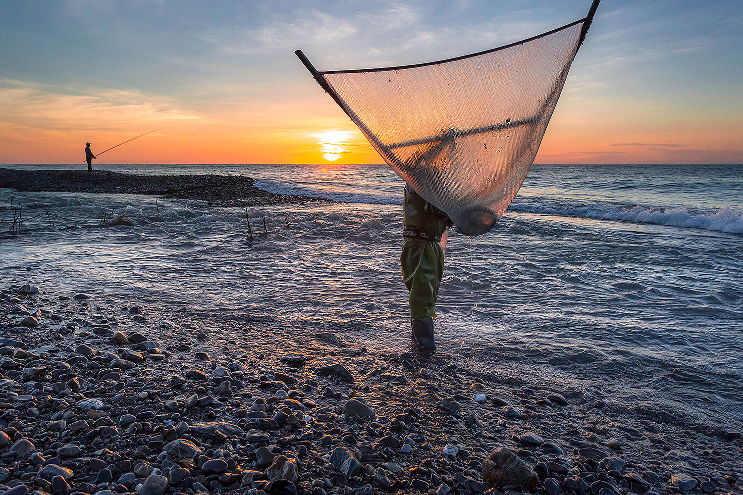 “Fishing at Dawn” by Brandon Ho, ‘18 / Jinlun, Taitung, Taiwan “I was interested in the traditional methods of fishermen using a triangle net to catch fish so I woke up and spent the morning photographing them and learning more about their lives.”