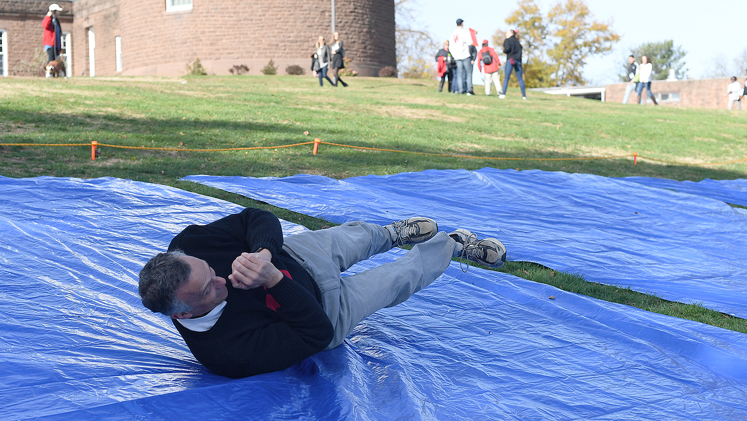 Wesleyan President Michael Roth participates in The Big Roll. 