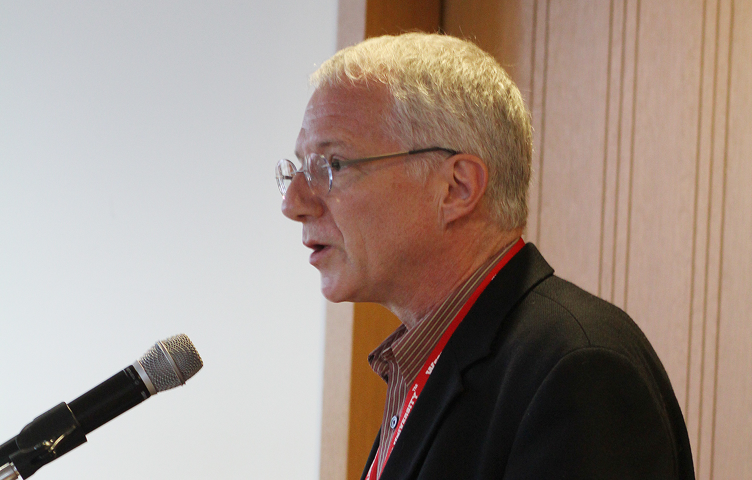 Bill Johnston, professor of history, professor of science in society, professor of East Asian studies, moderated the alumni panel. 