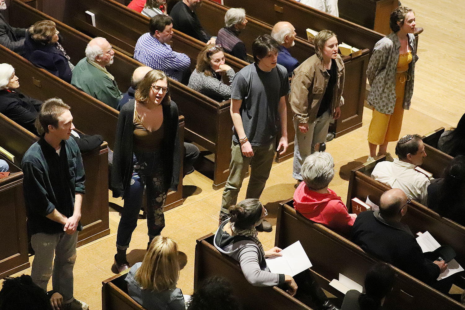 The panel discussion was followed by a ticketed concert featuring the premiere performance of "This Side of the Curtain.” The multimedia work was performed by more than 40 musicians and dancers from Wesleyan and the surrounding community, directed by Katja Kolcio.