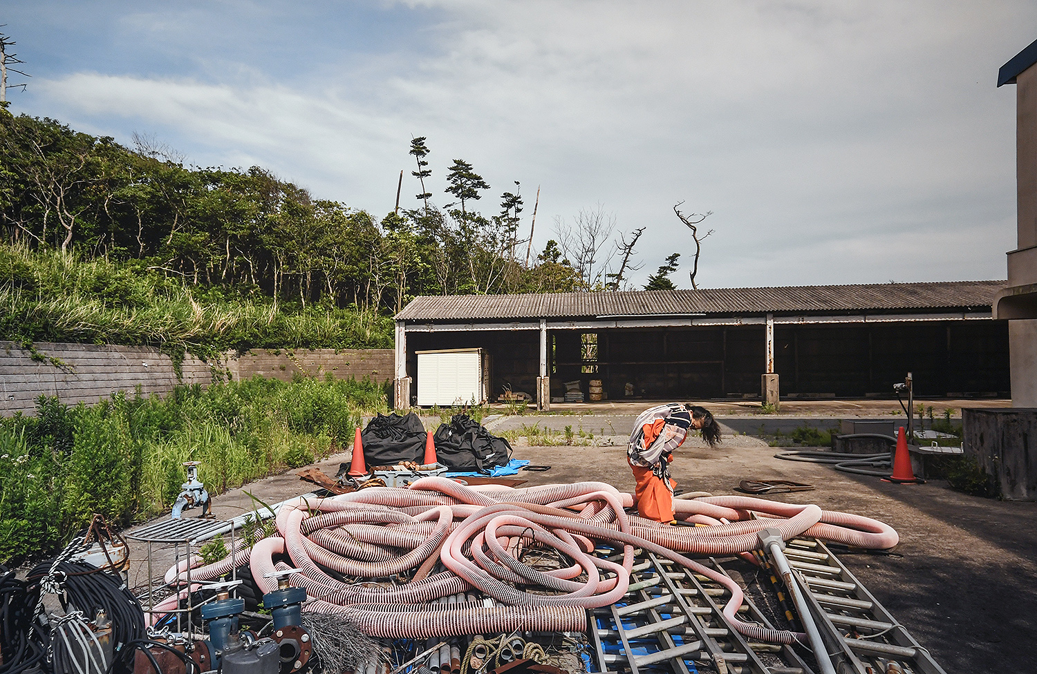 Eiko performed at the Tomiko Municipal Sanitation Plant June 26, 2017. The plant is located 4.3 miles south of the Fukushima Daiichi reactors and was damaged by the earthquake. Most Tomioka residents had left the community due to radiation caused by the Daiichi disaster and the plant closed. 