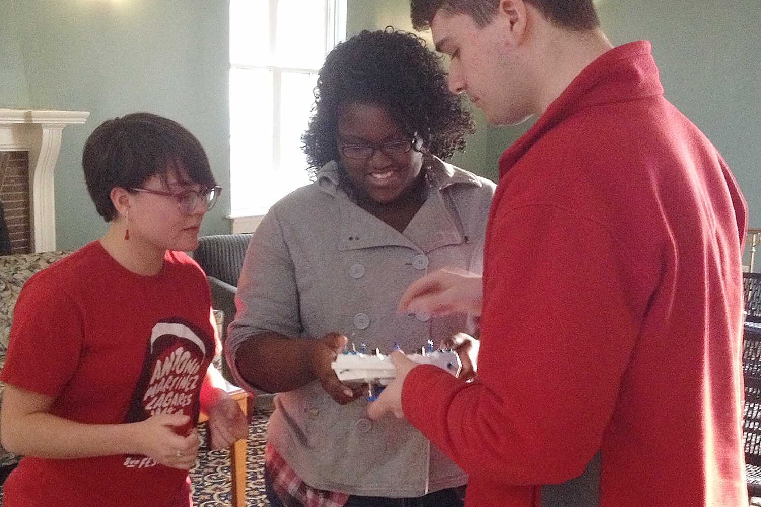 Ana Rodriguez Santory, Dominique Nunnelly ’19, and Andrew Rogers ‘21 learned how to fly drones. 