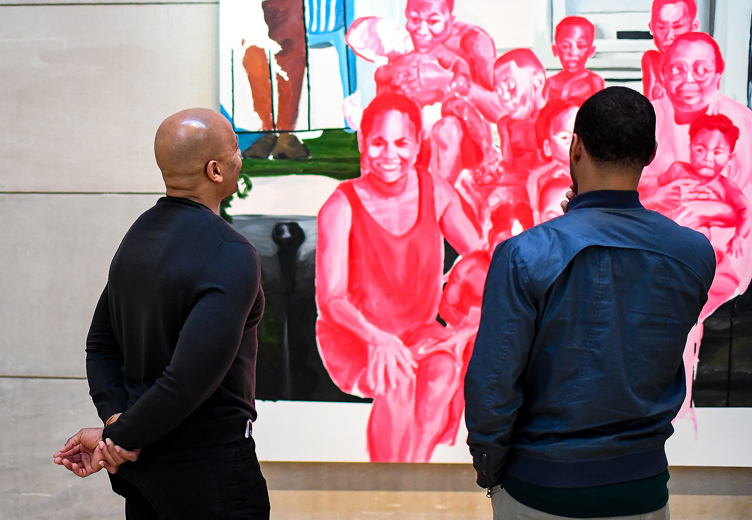 Attendees admire Robinson's painting. 