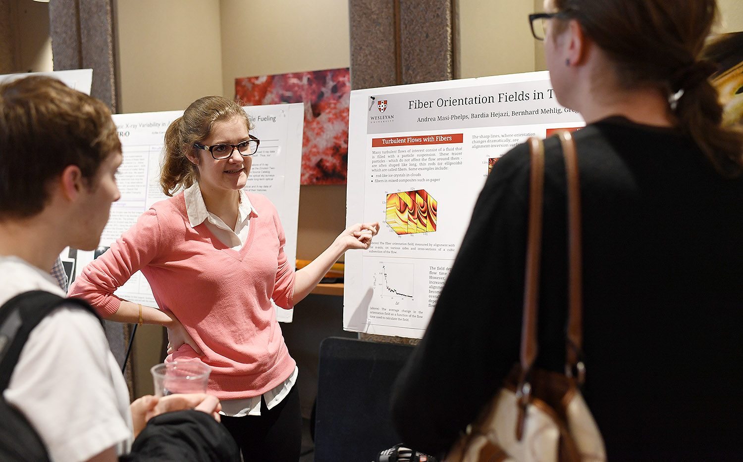 Andrea Masi-Phelps shared her research titled “Fiber Orientation Fields in Turbulence.” Her advisor is Greg Voth. 