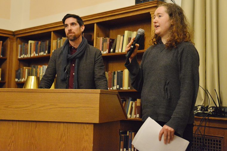 Elinor Weissberg ’20 gives a summary of her paper, with Michael Meere, chair of the Friends. (Image courtesy of Caroline Kravitz)