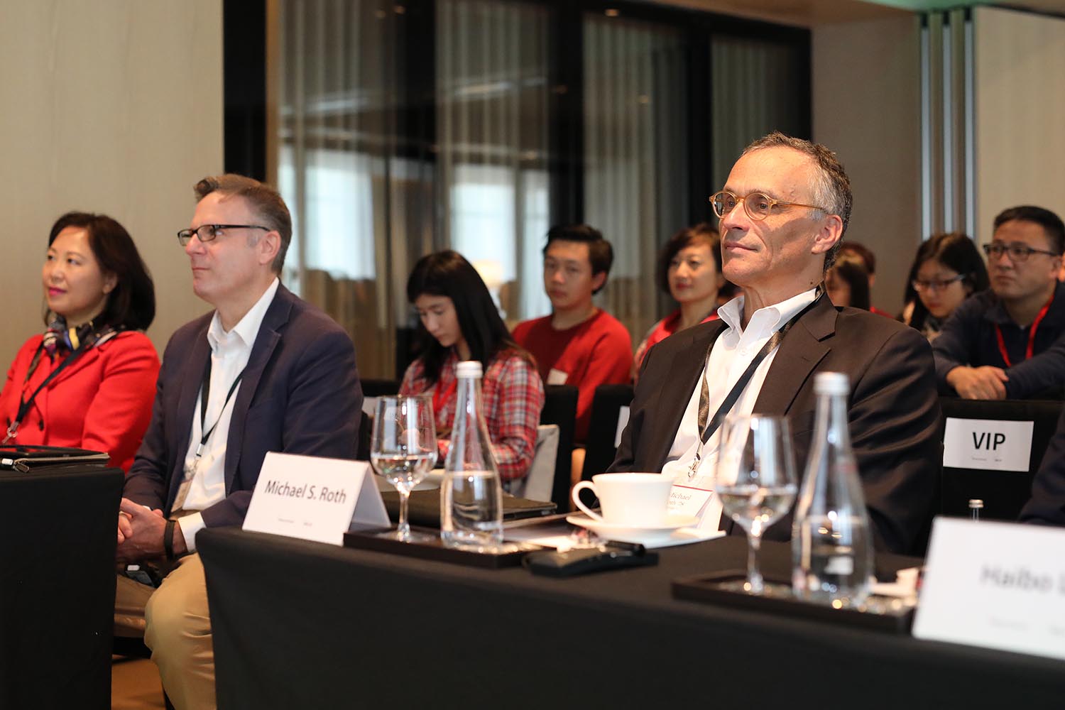 Front row, from left, Julia Zhu, Scott Higgins, and Michael Roth.