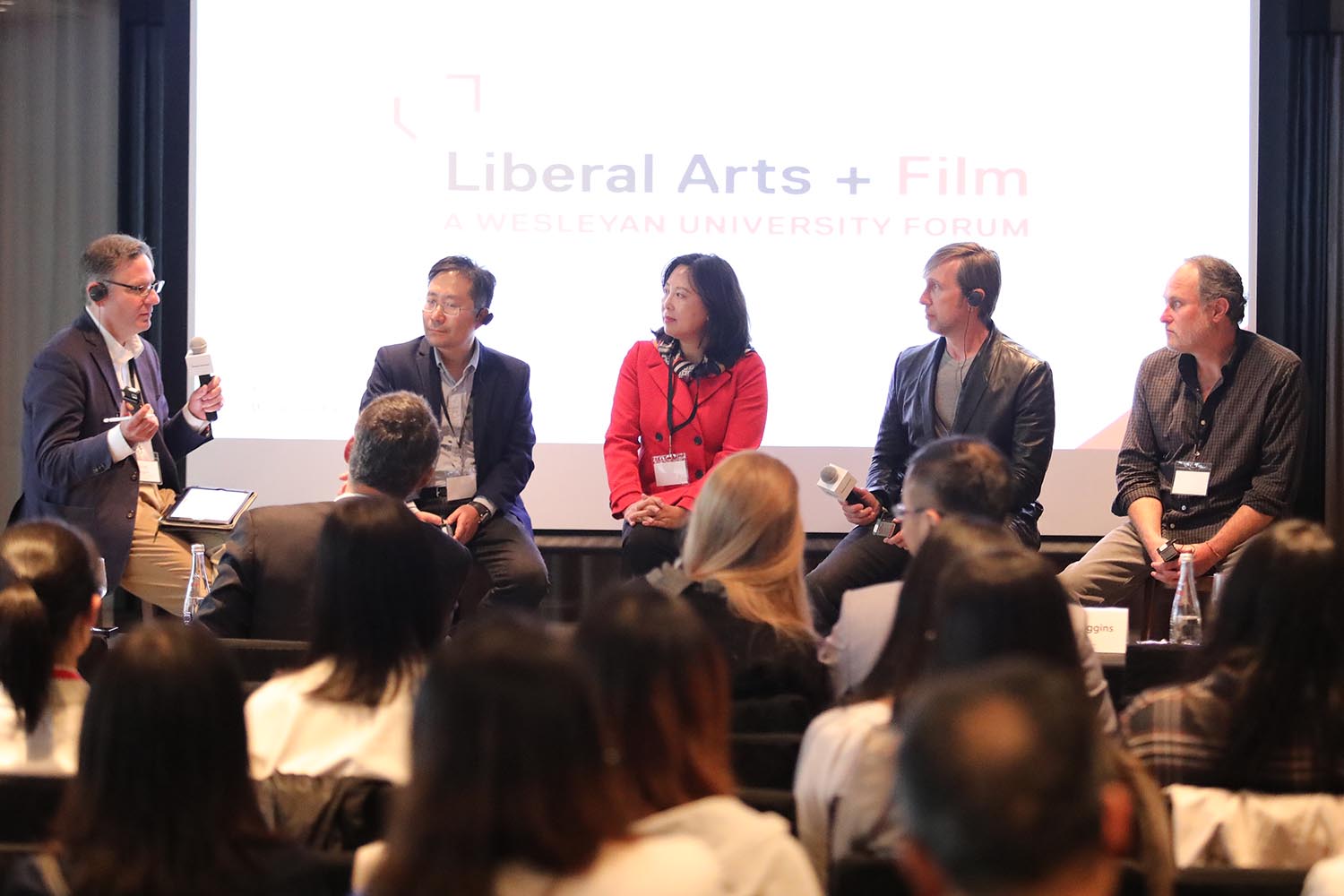 From left, Scott Higgins, Professor Haibo Liu, Julia Zhu, Jon Hoeber, and Jon Turteltaub.